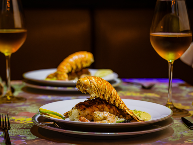 Treat Yourself a Delicious Grilled Lobster Tail and a Stunning Show at Le Petit Chef